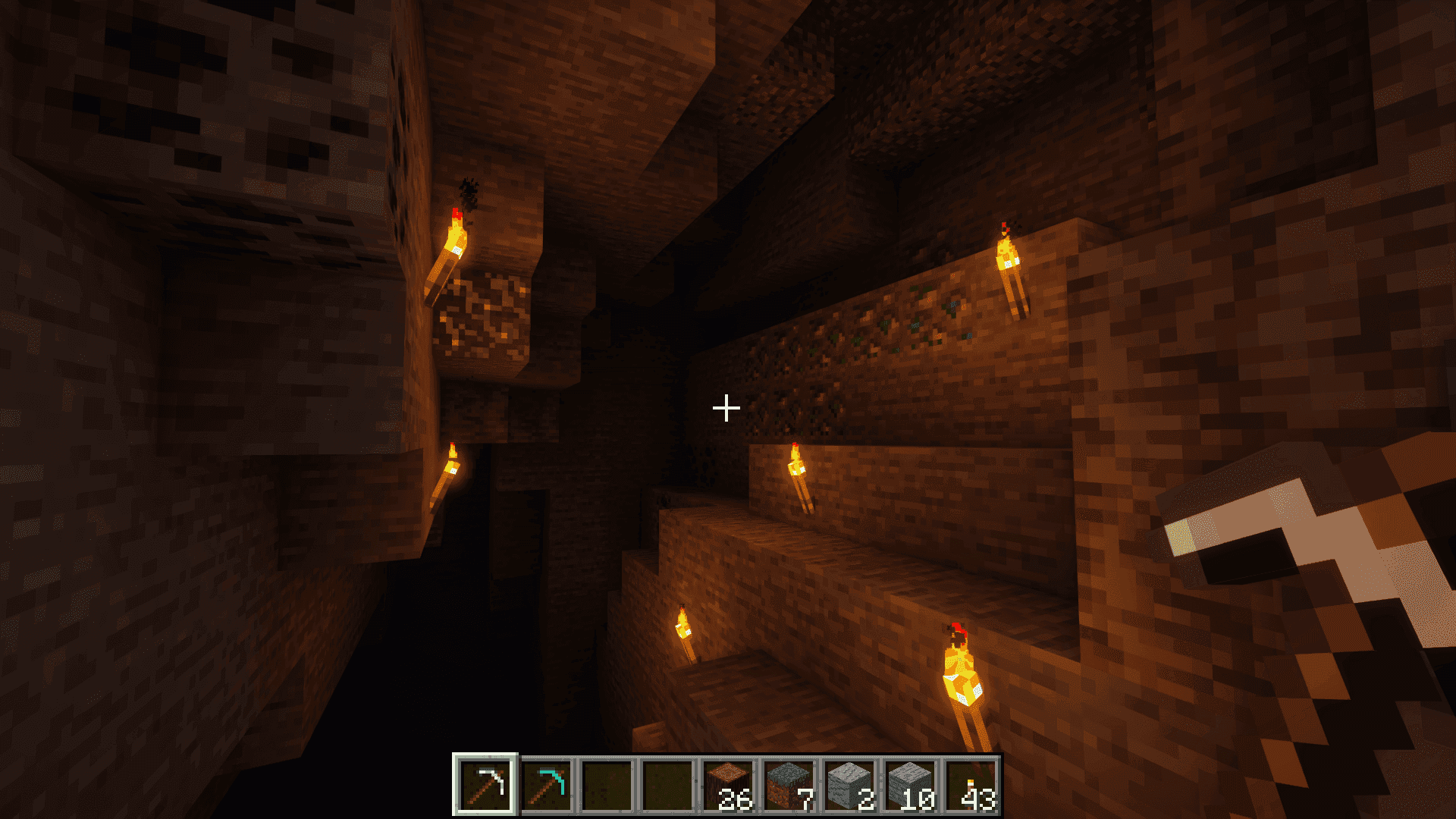 A Minecraft player follows safety tips while mining to avoid falling into lava or deep pits.