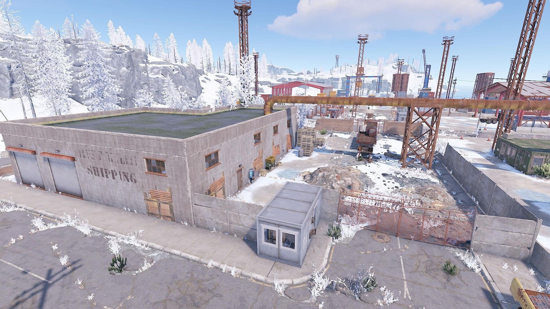 The grey Shipping building and fenced recycler courtyard at the Rust Large Harbor monument