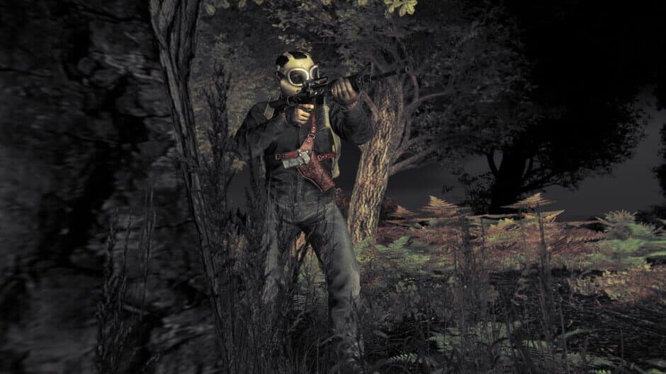 A geared DayZ survivor in a gas mask and chest rig aiming a rifle from a treeline at night