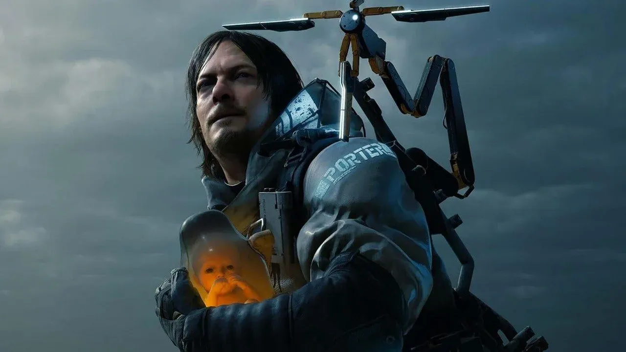 Sam Porter Bridges carries a BB pod against a dark cloudy sky in the polarizing masterpiece Death Stranding.