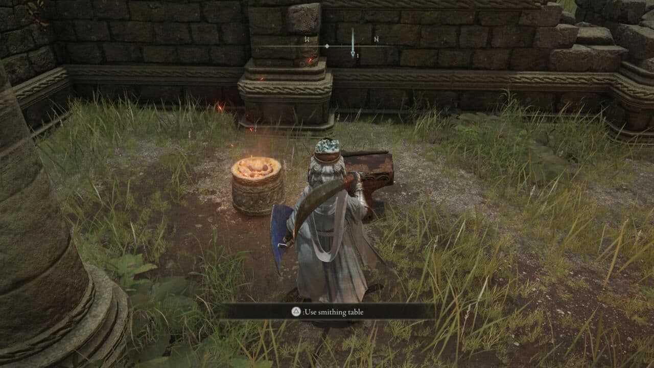 Elden Ring player character using the smithing table at the Church of Elleh in Limgrave.