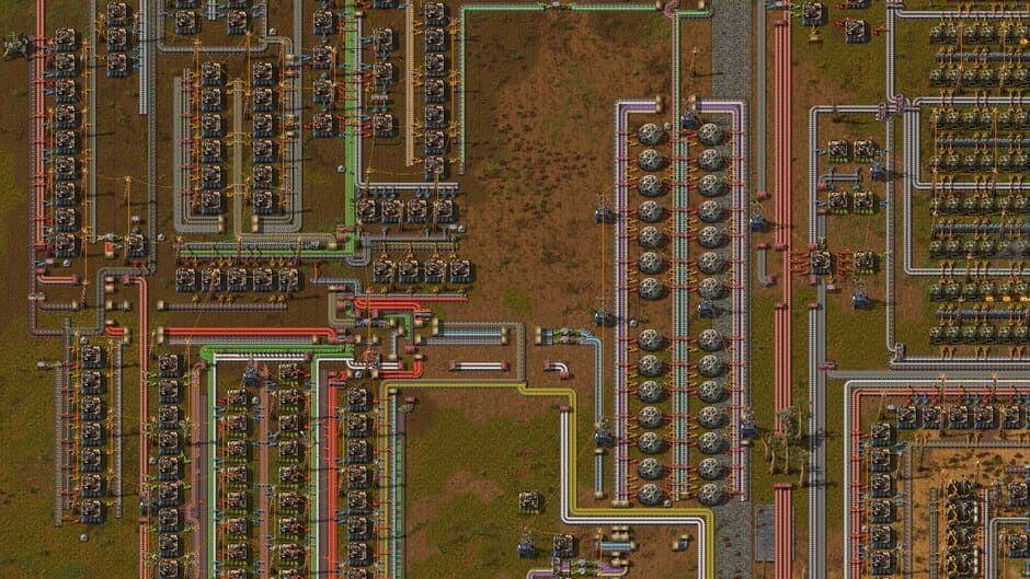 Factorio oil processing and chemical plant setup with complex piping.