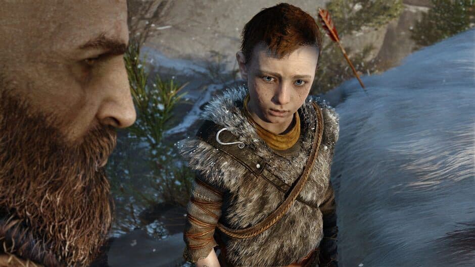 A detailed God of War screenshot showcasing the game's environmental storytelling and companion interactions.