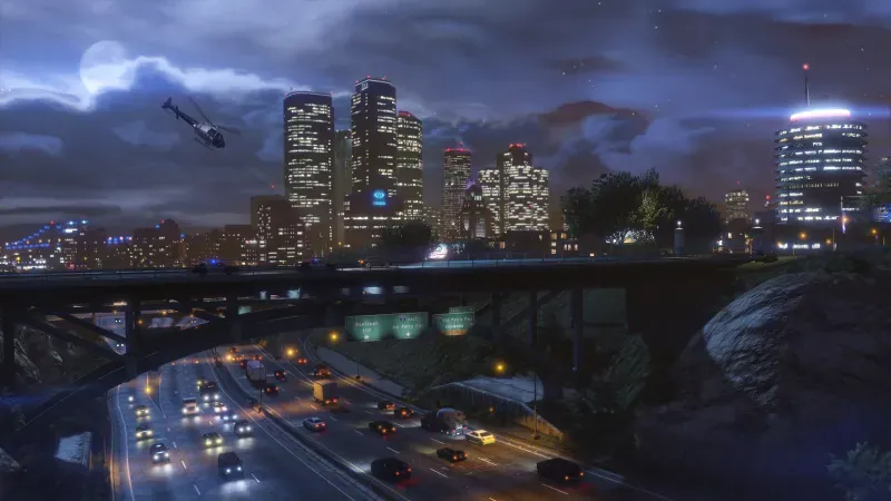 The sun sets over the desert landscape surrounding Los Santos in Grand Theft Auto V.