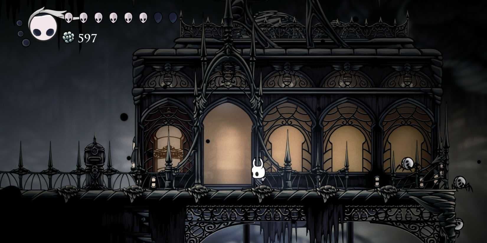 The Knight stands near the Ancient Basin tramway in Hollow Knight where Pale Ore can be found.