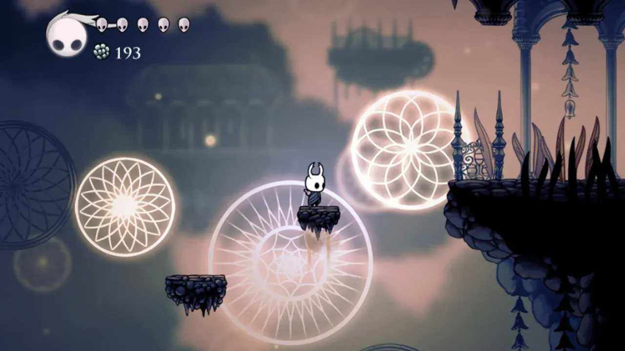 The Knight stands on a platform in a misty landscape, representing the atmospheric world of Hollow Knight.