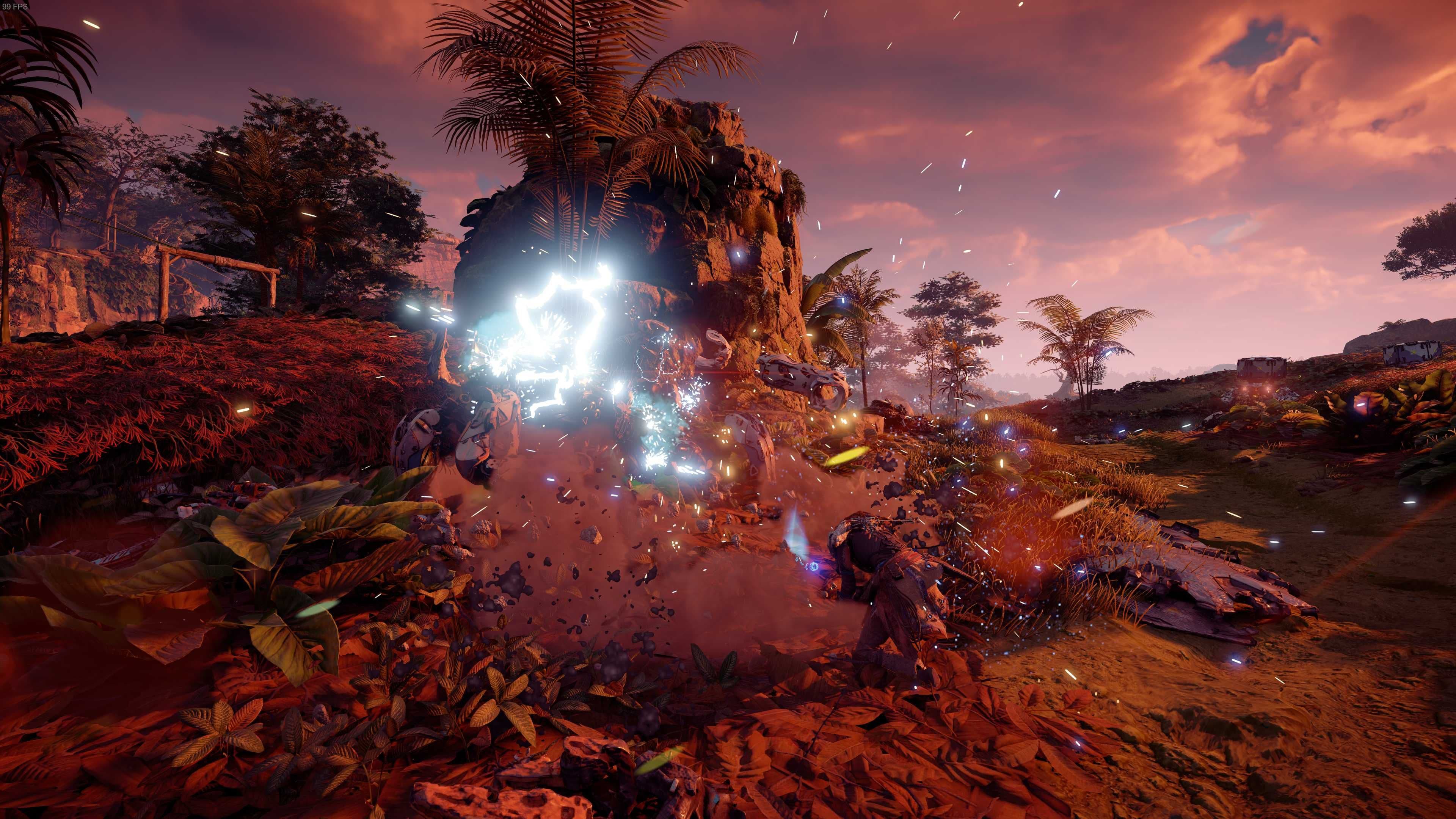 Aloy performs a heavy spear strike on a machine in Horizon Zero Dawn, demonstrating melee combat mechanics.