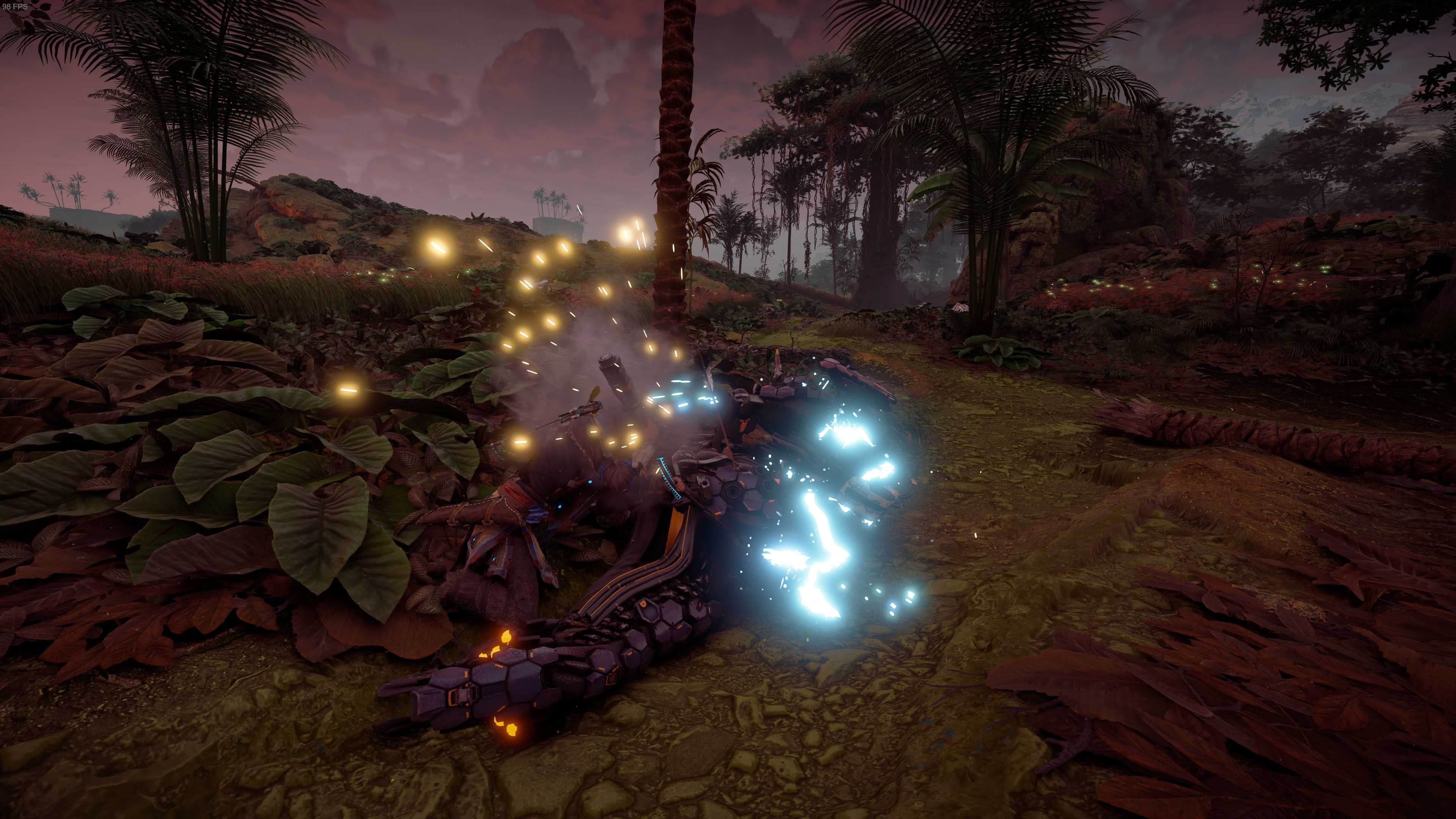 Aloy performs a Critical Hit spear strike on a downed Stalker in Horizon Zero Dawn.