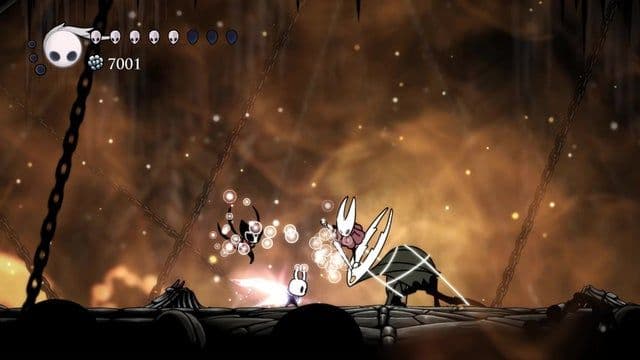 A late-game encounter with Hornet in a web-covered environment in Hollow Knight.