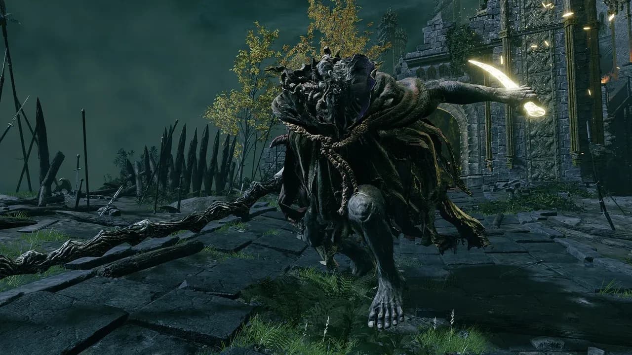 Margit the Fell Omen stands menacingly with his staff before the gates of Stormveil Castle in Elden Ring.