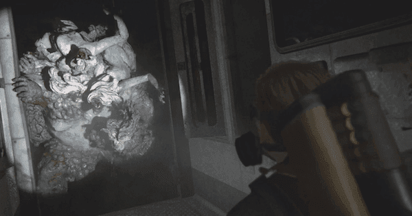 Abby faces the terrifying Rat King boss in the dark hospital basement of The Last of Us Part II.