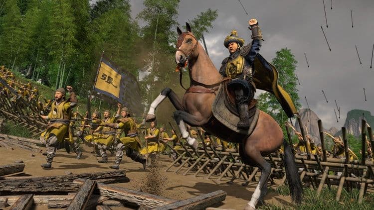 A mounted leader in War of the Three Kingdoms leading troops with banners during a stormy battle.