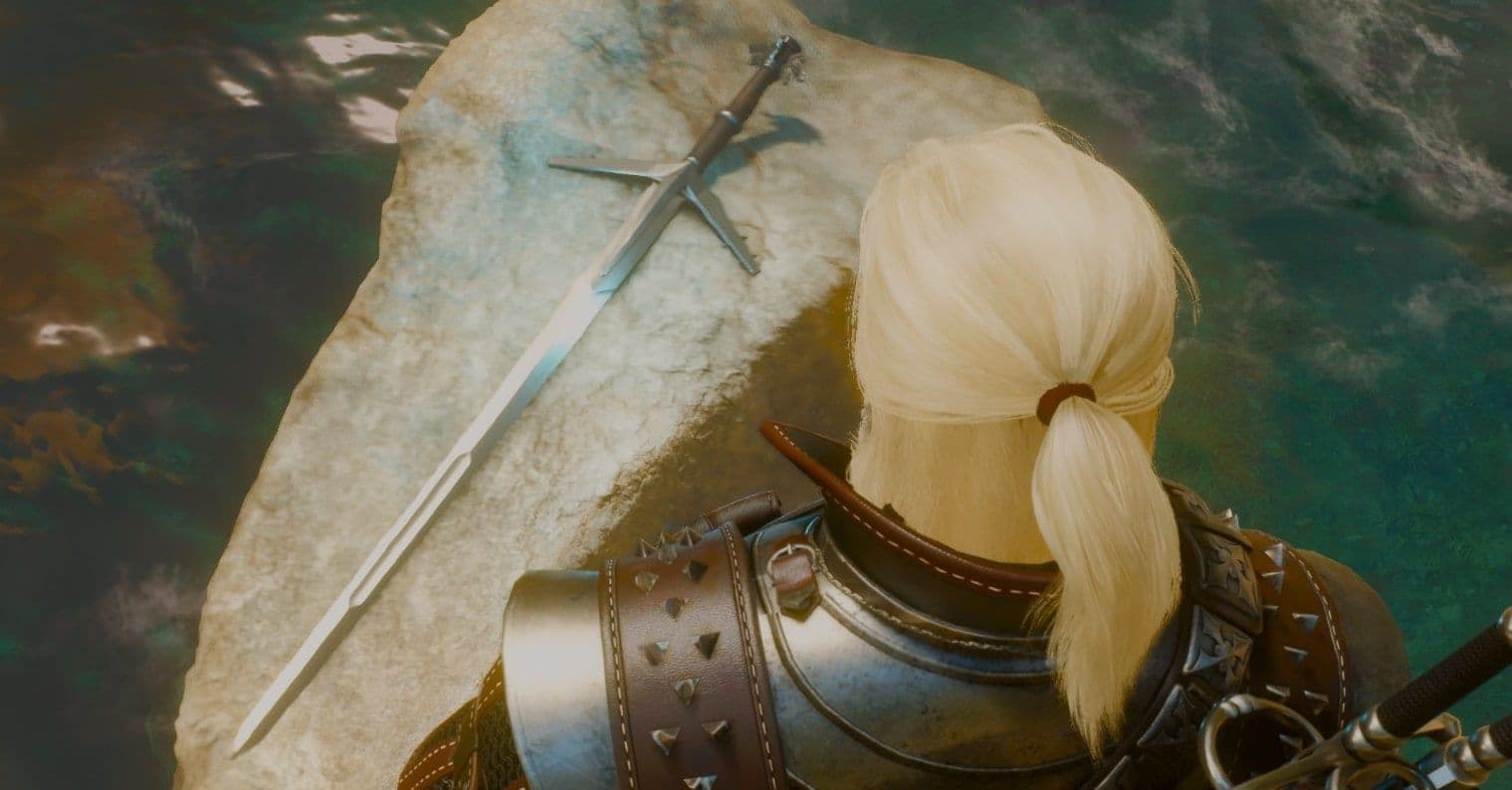 The Aerondight silver sword resting on a stone underwater in The Witcher 3.