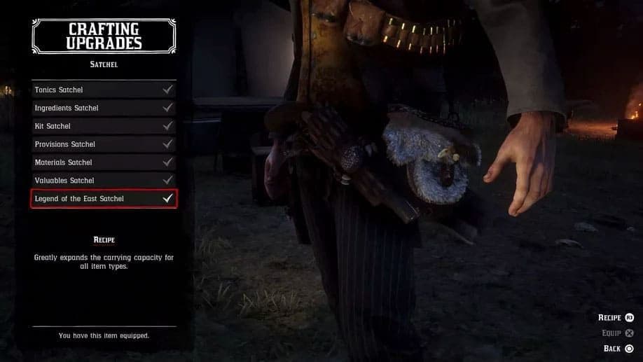 Arthur Morgan standing outdoors with the Legend of the East Satchel crafting option checked in the menu.
