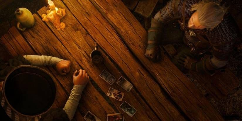 The Witcher 3 Gwent card game table showing the different unit rows and deck areas.