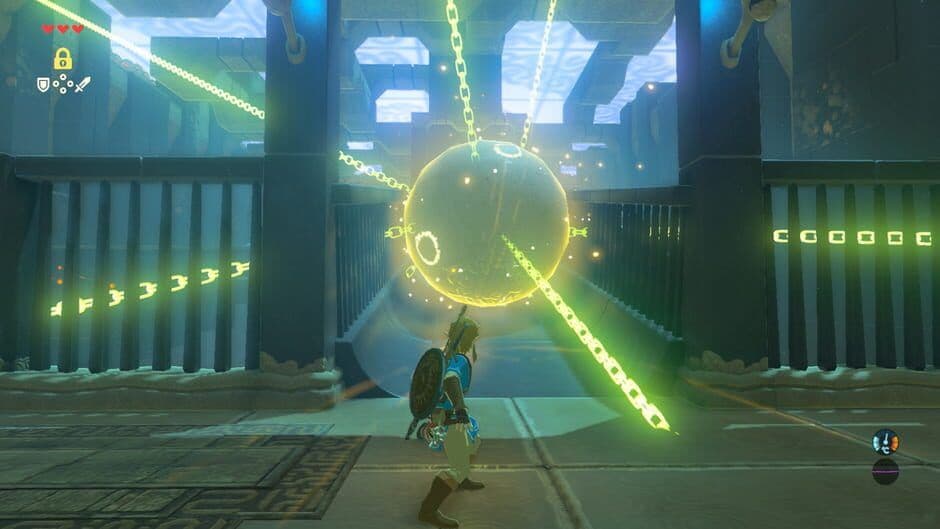 Link se encuentra cerca de una estructura ancestral Sheikah en una captura de pantalla de Breath of the Wild.