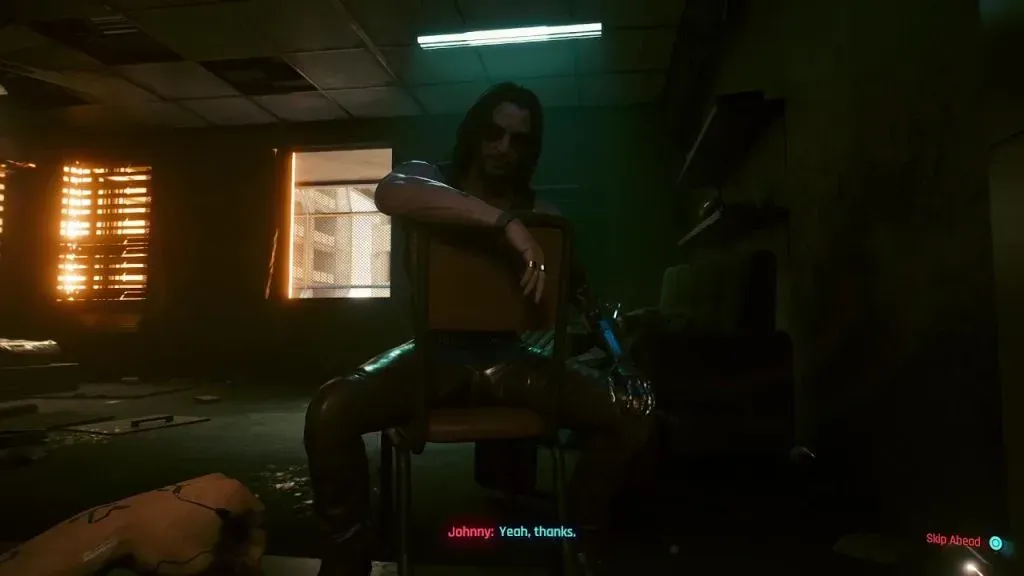 Johnny Silverhand talks to V in a Pacifica hotel during the Tapeworm quest in Cyberpunk 2077.
