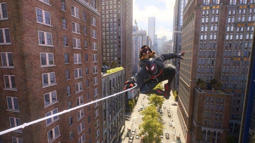 Peter Parker swings through New York City showcasing the fluid movement mechanics in Marvel's Spider-Man 2.