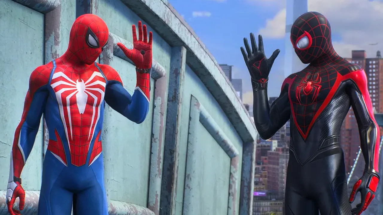 Spider-Man and Miles Morales wave from a rooftop overlooking the detailed cityscape in Marvel's Spider-Man 2.