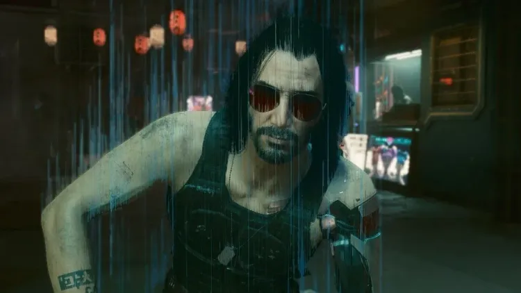 V wearing Johnny Silverhand's iconic Samurai jacket and aviators while holding his Malorian Arms 3516 in Cyberpunk 2077.