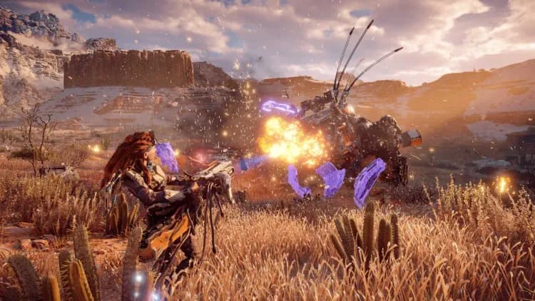 Aloy uses a powerful Disc Launcher to blast a Thunderjaw in Horizon Zero Dawn, showcasing high-tech heavy weaponry.