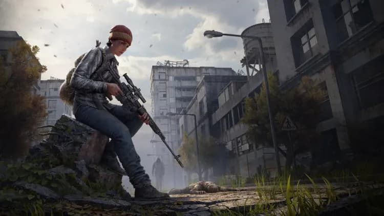 A DayZ survivor carries a backpack through an abandoned city.