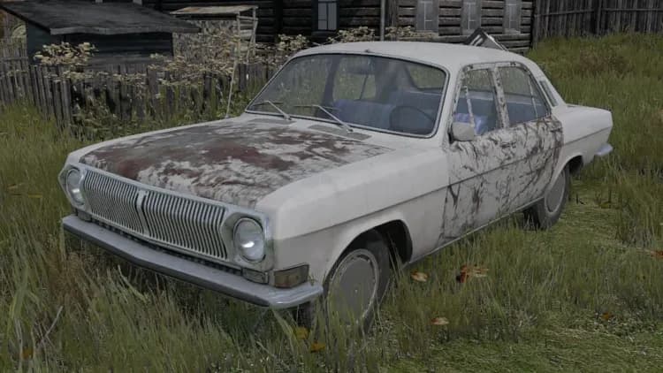 A weathered white DayZ sedan parked in overgrown grass beside a rural house.