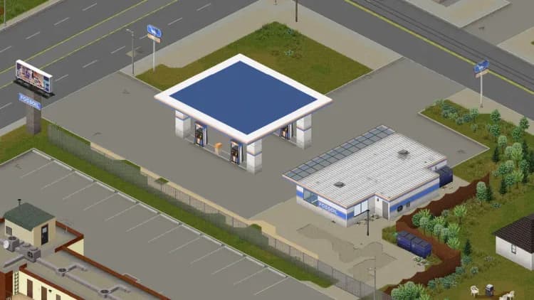 A Fossoil gas station in Muldraugh in Project Zomboid, with its pump island under a blue canopy and the convenience store beside it