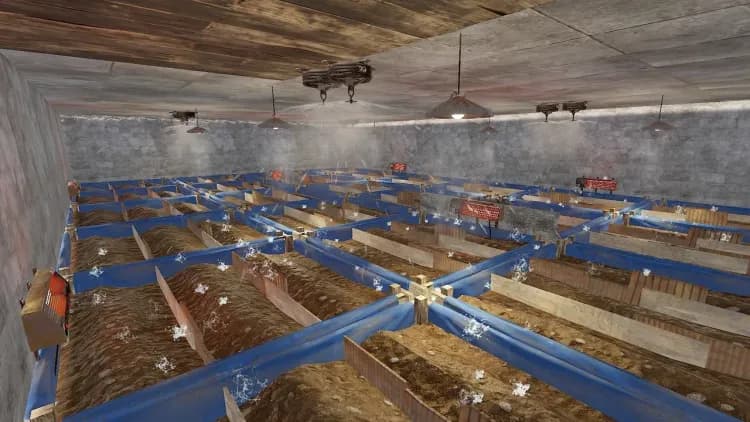 Rust indoor farm with planter boxes, sprinklers, and ceiling lights