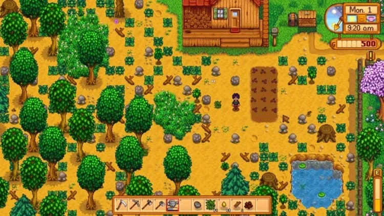 A new farmer tends to initial crops and cleared land during the first week of spring in Stardew Valley.