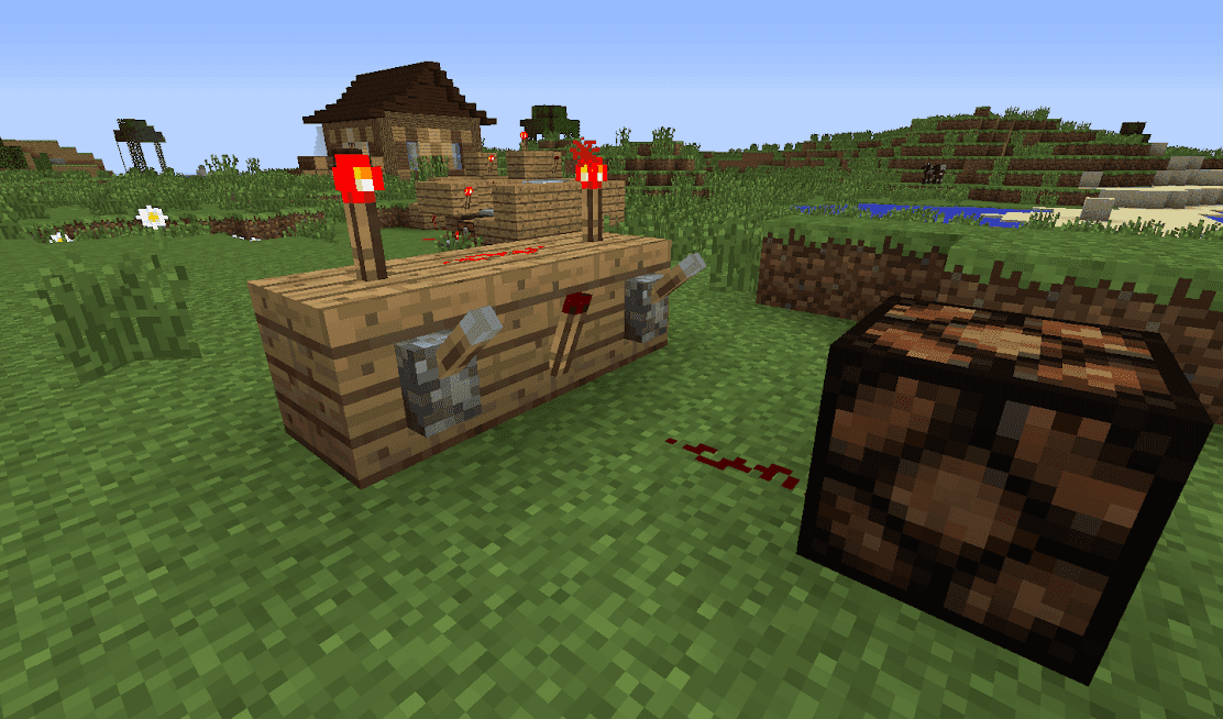 A basic Minecraft redstone AND gate featuring two levers as inputs and a redstone torch output.
