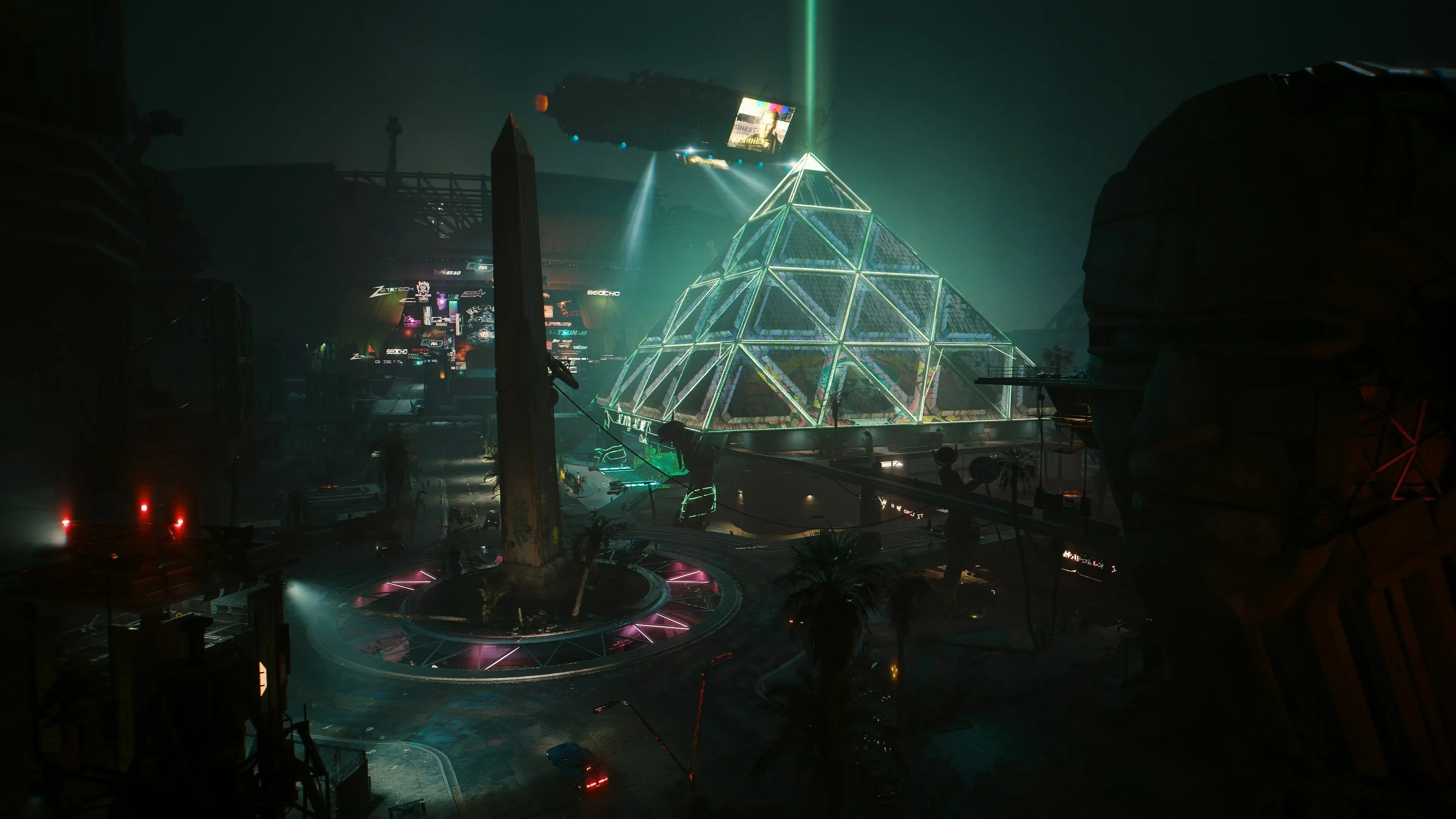 The illuminated glass pyramid of the Black Sapphire in Dogtown, with a Barghest aerial vehicle overhead, in Cyberpunk 2077