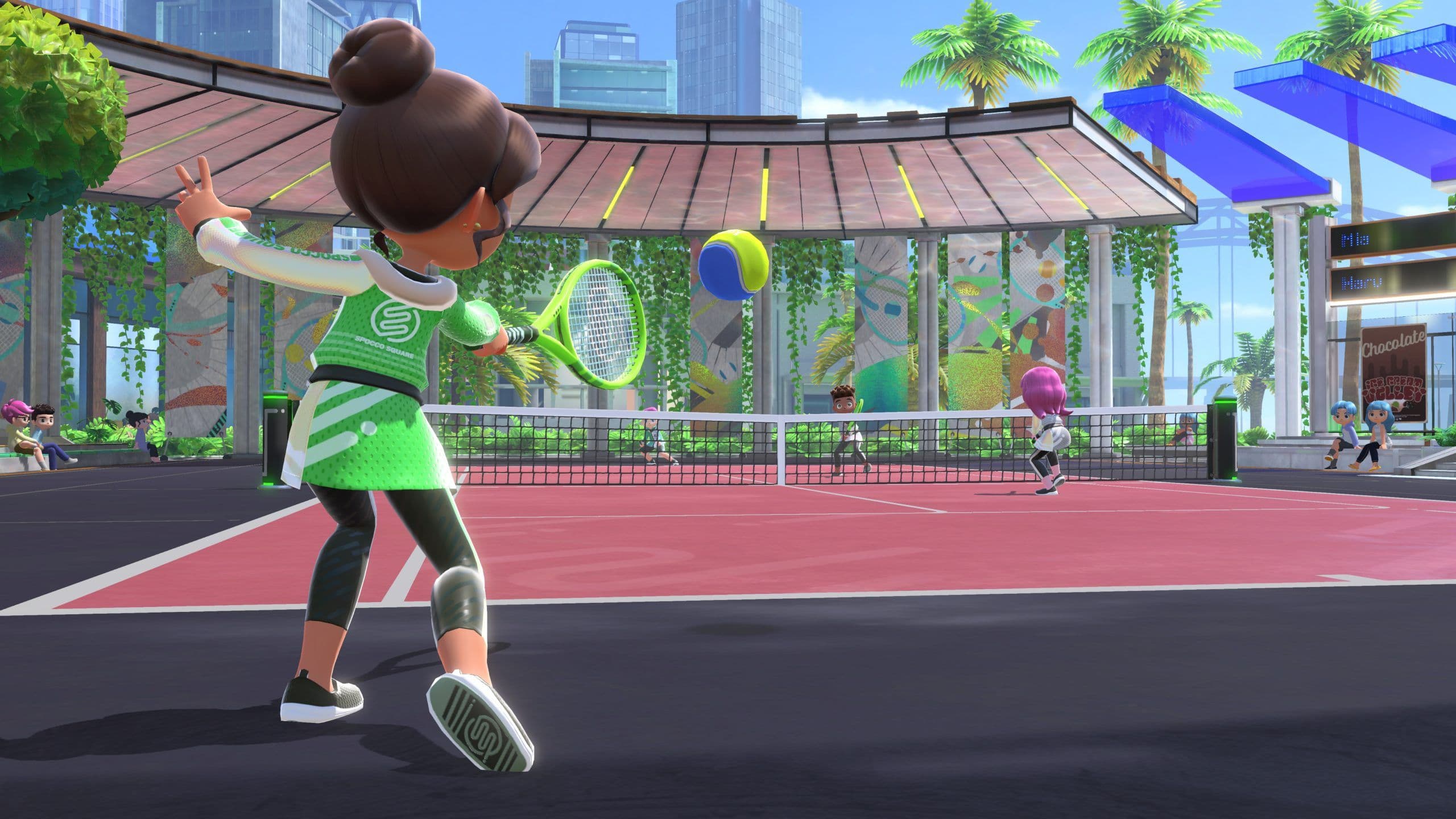 Un personaje compite en un partido de tenis en Nintendo Switch Sports, destacando la estética urbana colorida del resort del juego.