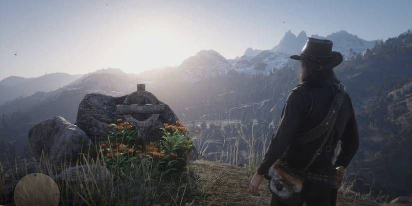 John Marston visits Arthur Morgan's grave in the Red Dead Redemption 2 secret completionist ending.