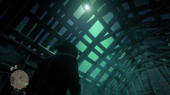 Arthur Morgan interactúa con un rehén en un sótano en Red Dead Redemption 2