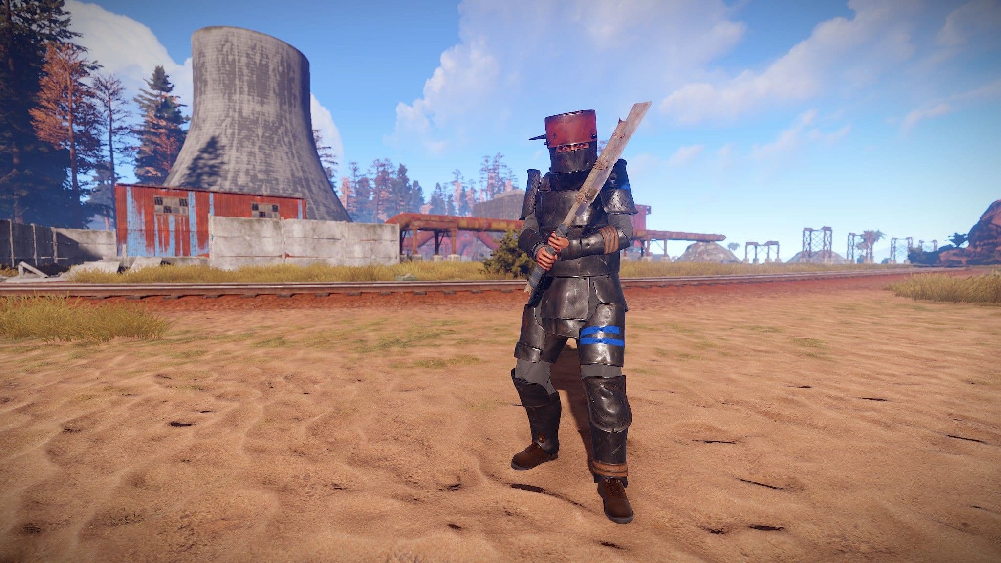 A player wearing Heavy Plate armor inside a Rust monument.