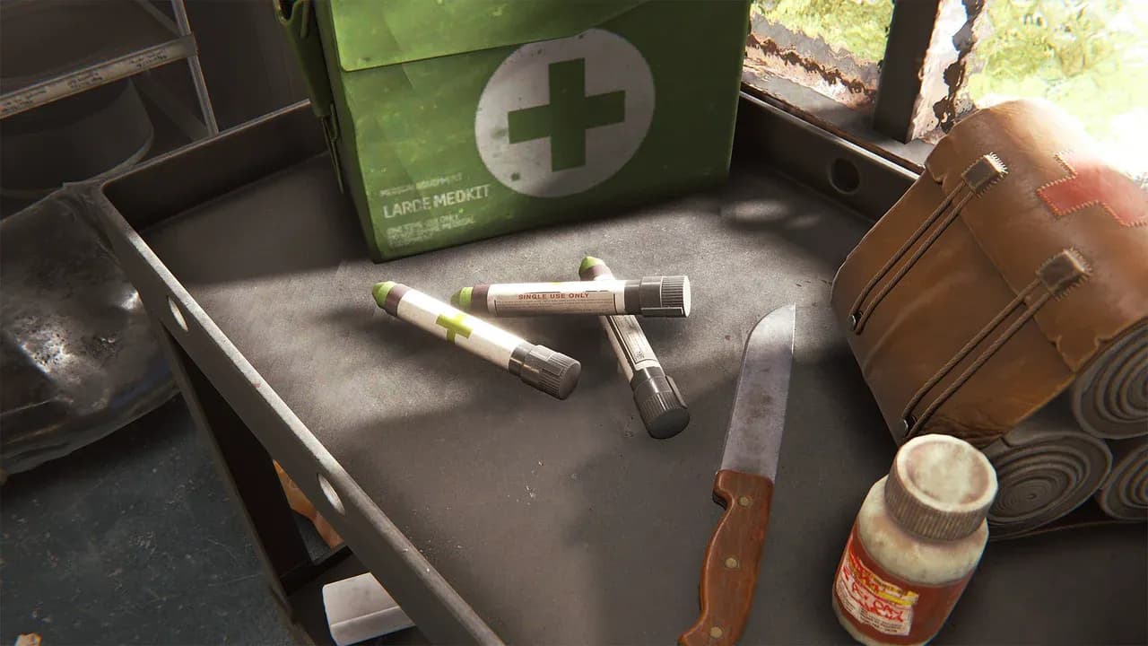 Medical Syringes beside a Large Medkit and rolled bandages in Rust
