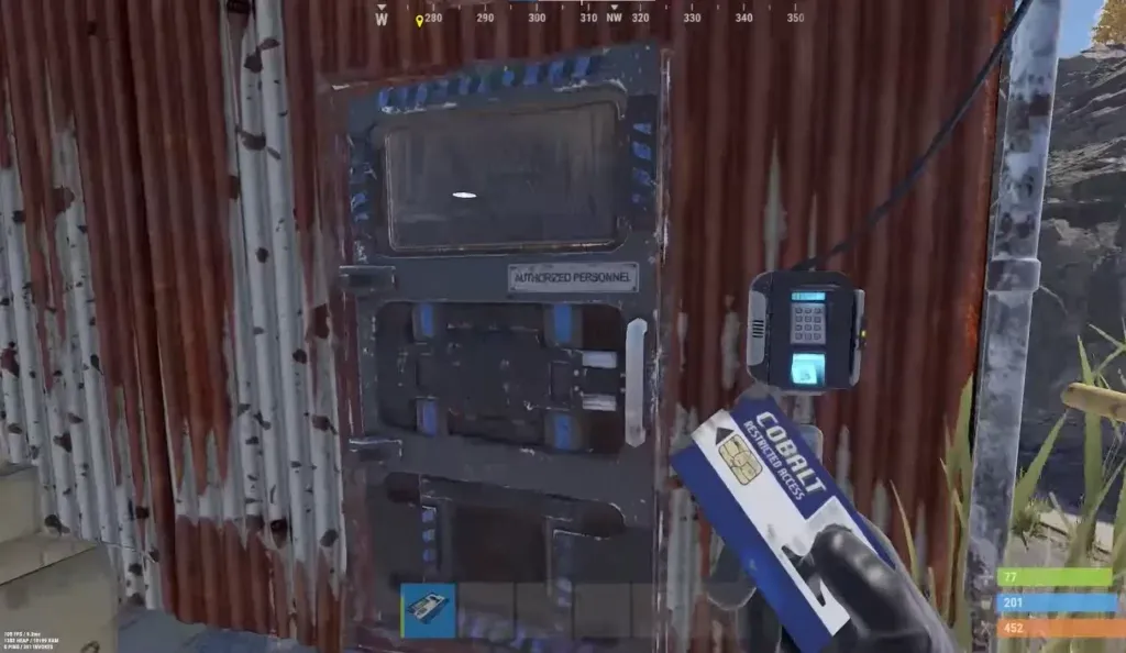Rust player holding a blue keycard at the Water Treatment Plant card door