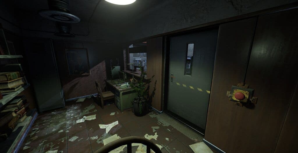 The security checkpoint by the exit of Rust's Nuclear Missile Silo, with the red exit button in a yellow housing beside the hazard-striped blast door and a framed portrait on the wall