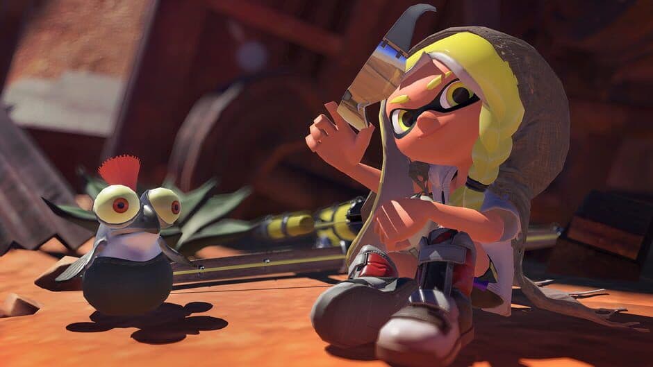 A Splatoon 3 gameplay screenshot showing the intense ink-based combat and colorful environments.