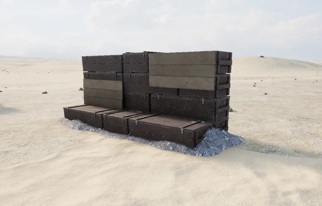 Squad's buildable Dirt Crates High Wall standing alone on open sand — stacked timber crates roughly one and a half soldiers tall, with a lower crate step along the base.