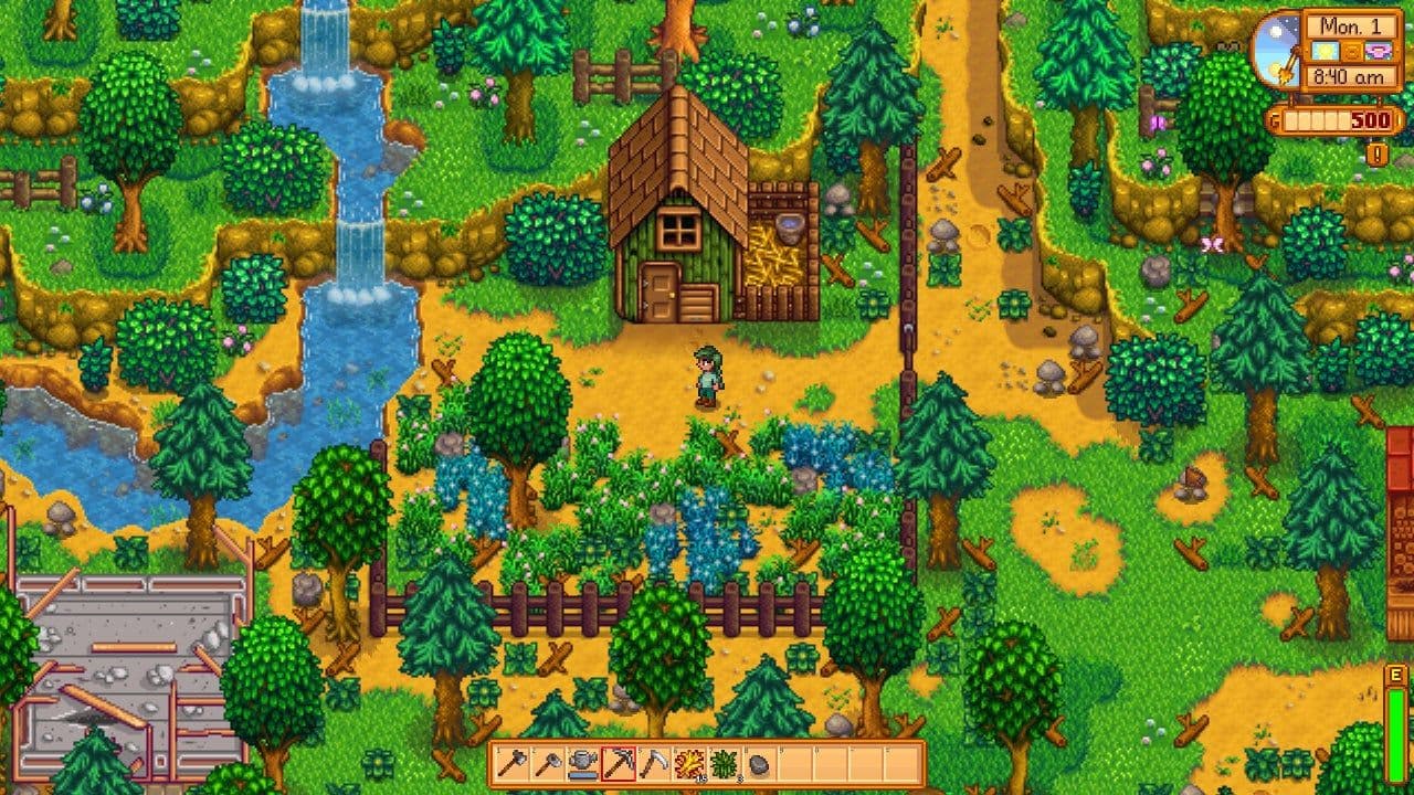 A Stardew Valley character stands near the hidden Mastery Cave entrance located in Cindersap Forest.