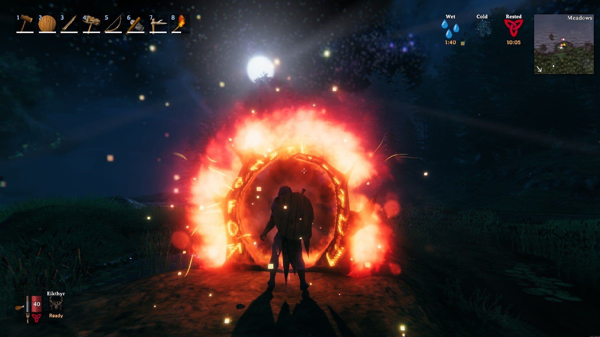 A glowing Valheim portal standing outside a base at night