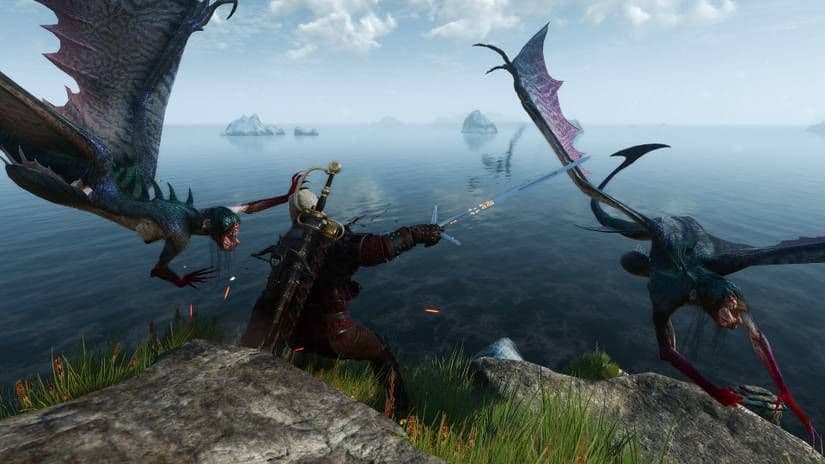 Geralt de Rivia lucha contra sirenas en un acantilado en la región de Skellige de The Witcher 3