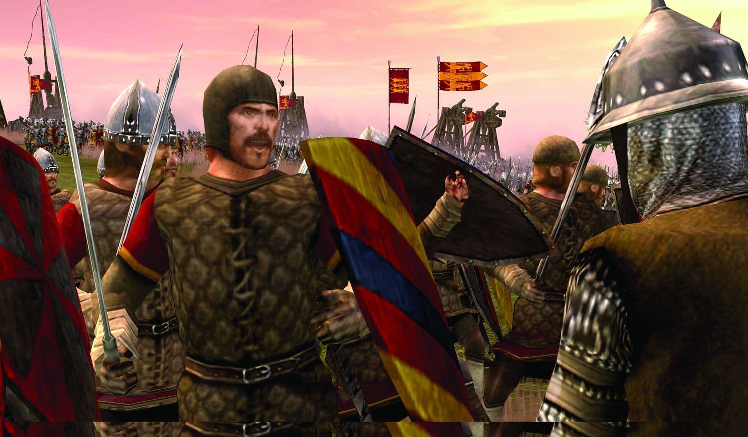 Medieval soldiers and siege engines prepare for battle in Total War Medieval III
