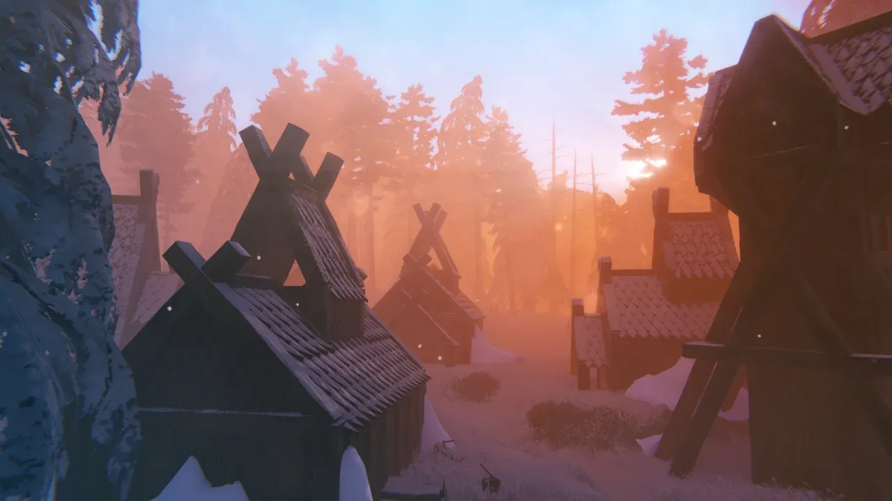 Abandoned Deep North village of snow-covered wooden longhouses at dawn in Valheim